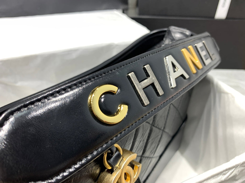 CHANEL HOBO BAG 25 WITH STRAP IN BLACK CALFSKIN GOLD AND SILVER HARDWARE