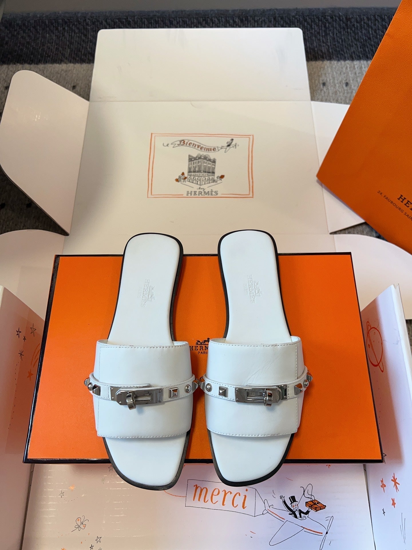 HERMES GIULIA FLAT SANDAL IN WHITE CALFSKIN