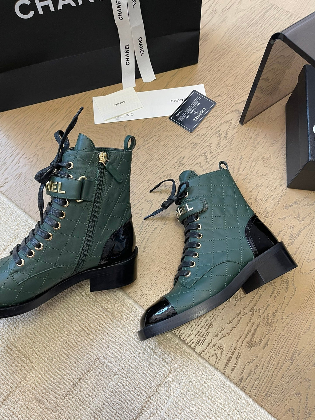 CHANEL ALPHABET MARTIN BOOTS IN FOREST GREEN LAMBSKIN