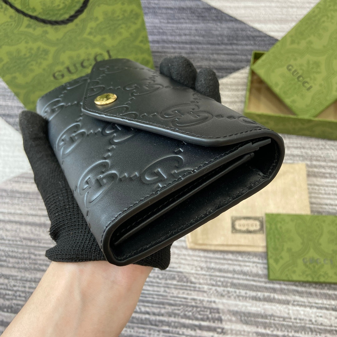 GUCCI CONTINENTAL WALLET 19 IN BLACK EMBOSSED CALFSKIN GOLD HARDWARE