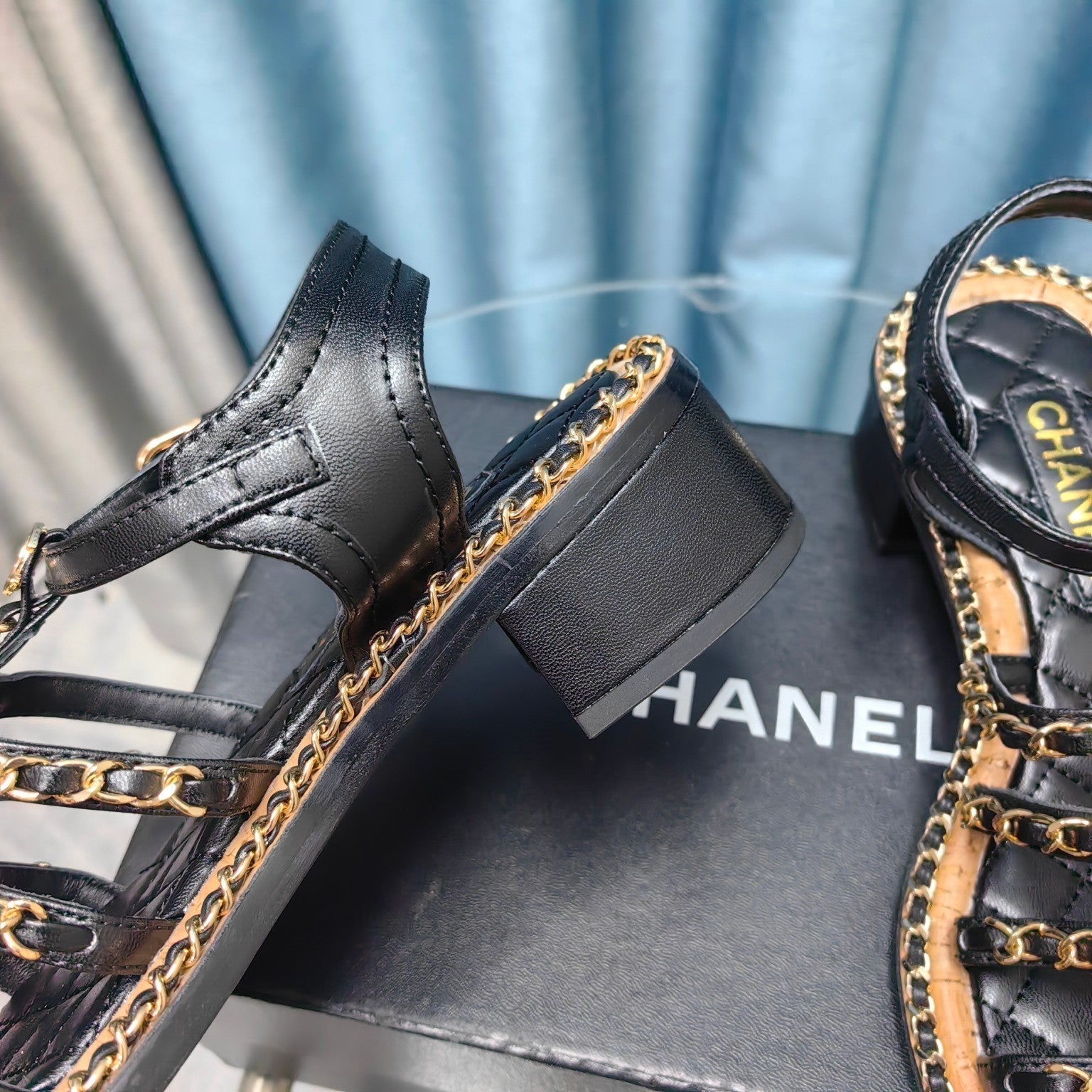 CHANEL HIGH SANDALS WITH THREE STRAPS IN BLACK CALFSKIN