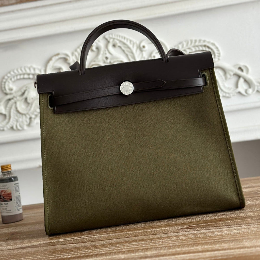HERMES ZIP CABINE 31 BAG IN OLIVE GREEN CANVAS AND BLACK CALFSKIN