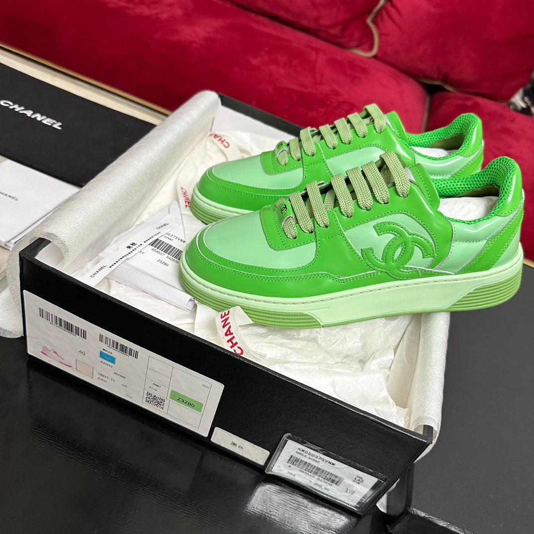 CHANEL TRAINERS IN LIGHT GREEN SHINY CALFSKIN