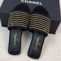 CHANEL FLAT SLIDE IN BLACK SUEDE WITH GOLD CRYSTALS