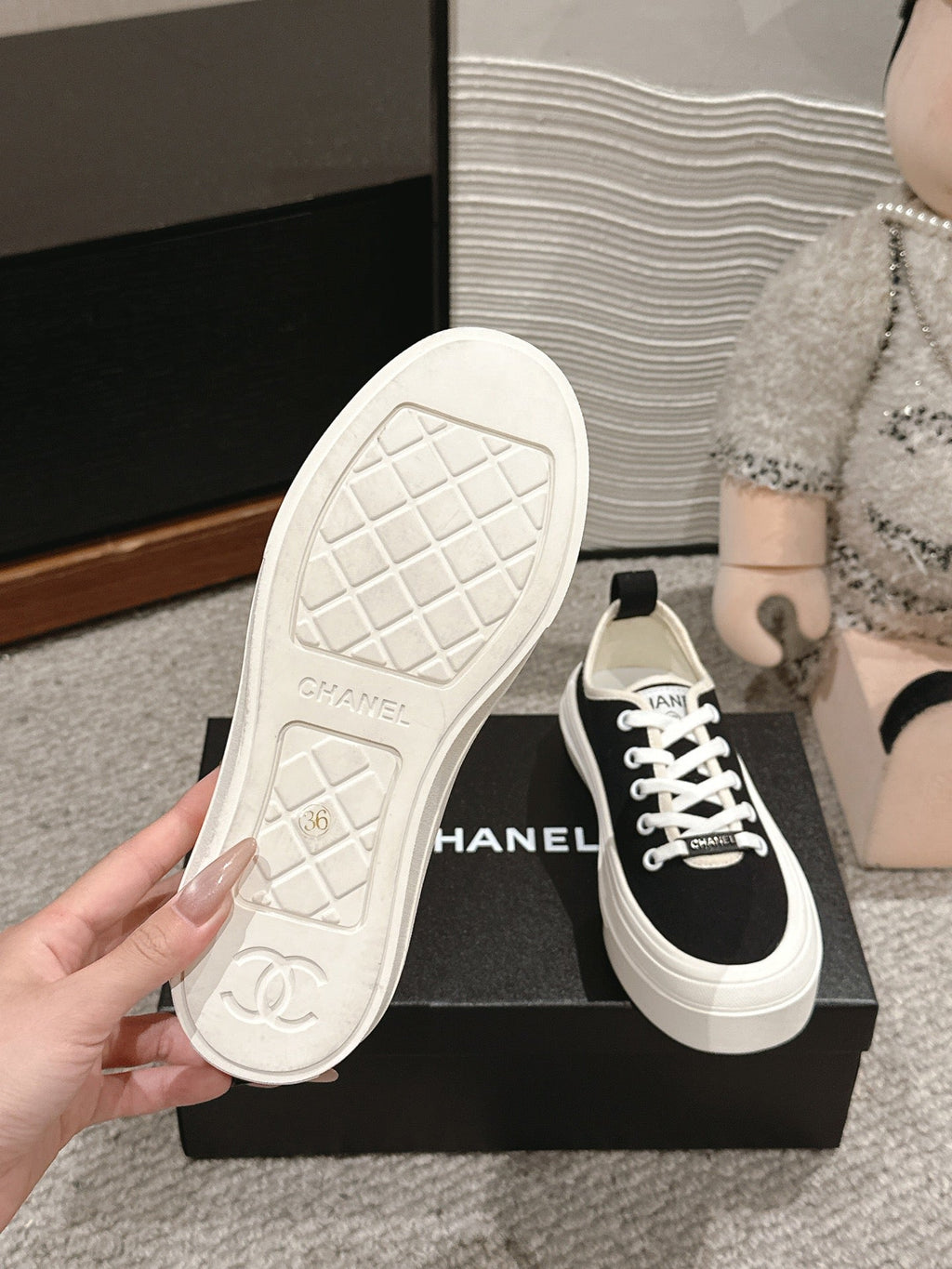 CHANEL LACE-UP SNEAKERS IN BLACK CANVAS