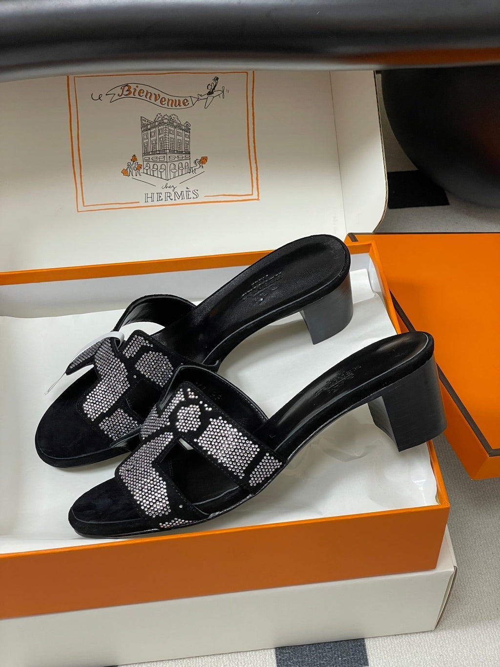 HERMES 25S ORAN HIGH‑HEEL SANDAL 50 MM IN BLACK LAMBSKIN WITH WHITE STONE DETAILS