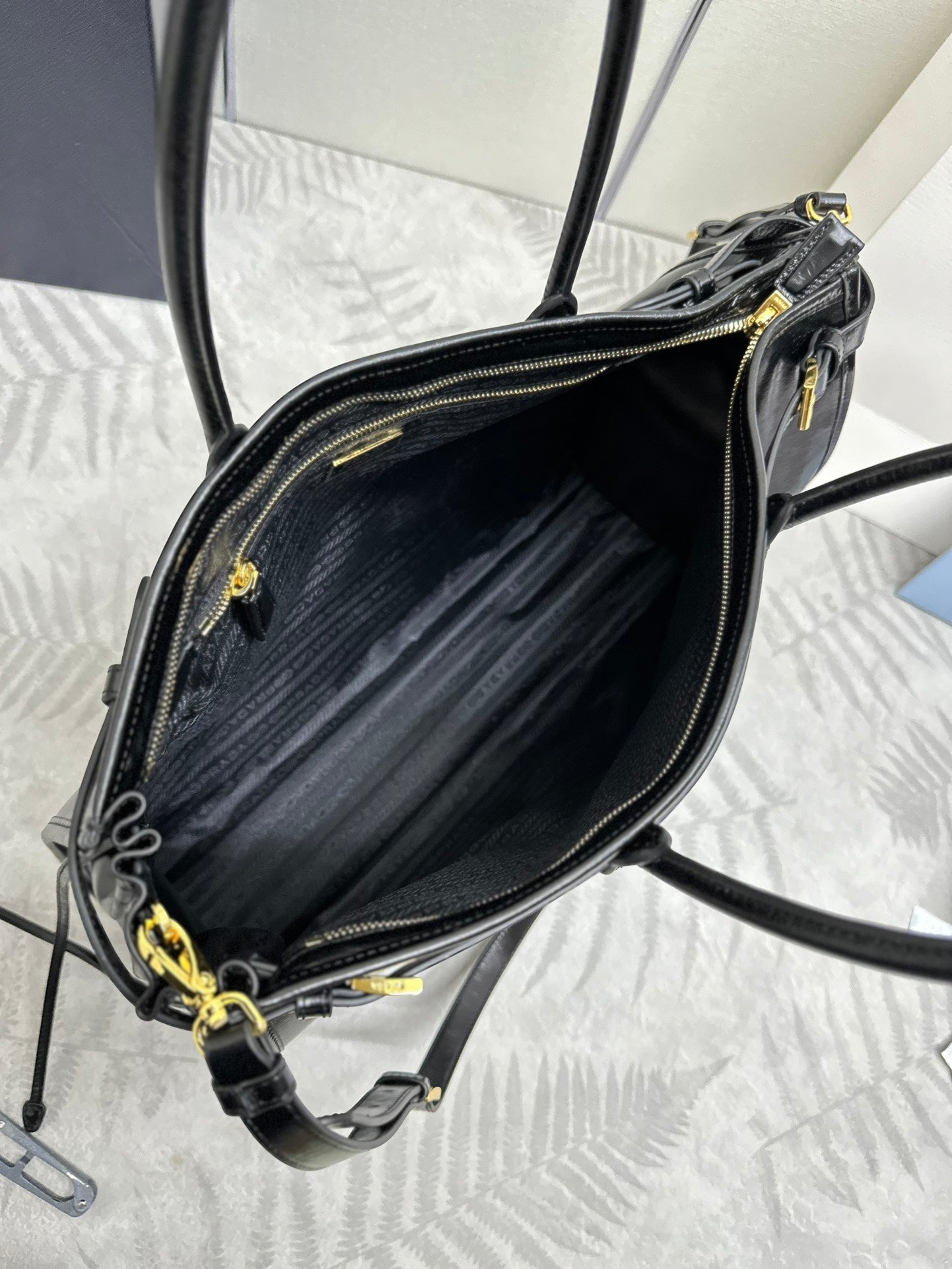 PRADA TOTE BAG WITH BELT 42 IN BLACK OIL WAX LAMBSKIN GOLD HARDWARE
