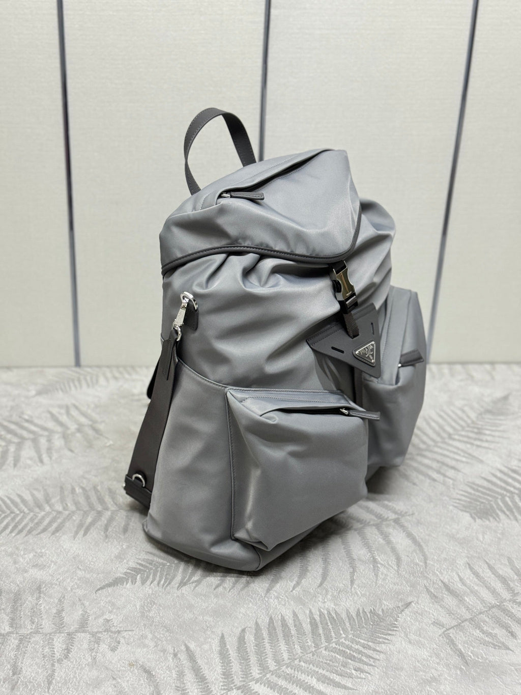 PRADA TRIANGLE LOGO BACKPACK 42 IN RHINO GRAY RE-NYLON