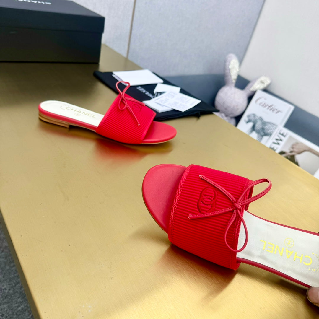 CHANEL BOW SLIPPERS IN CANDY RED LAMBSKIN