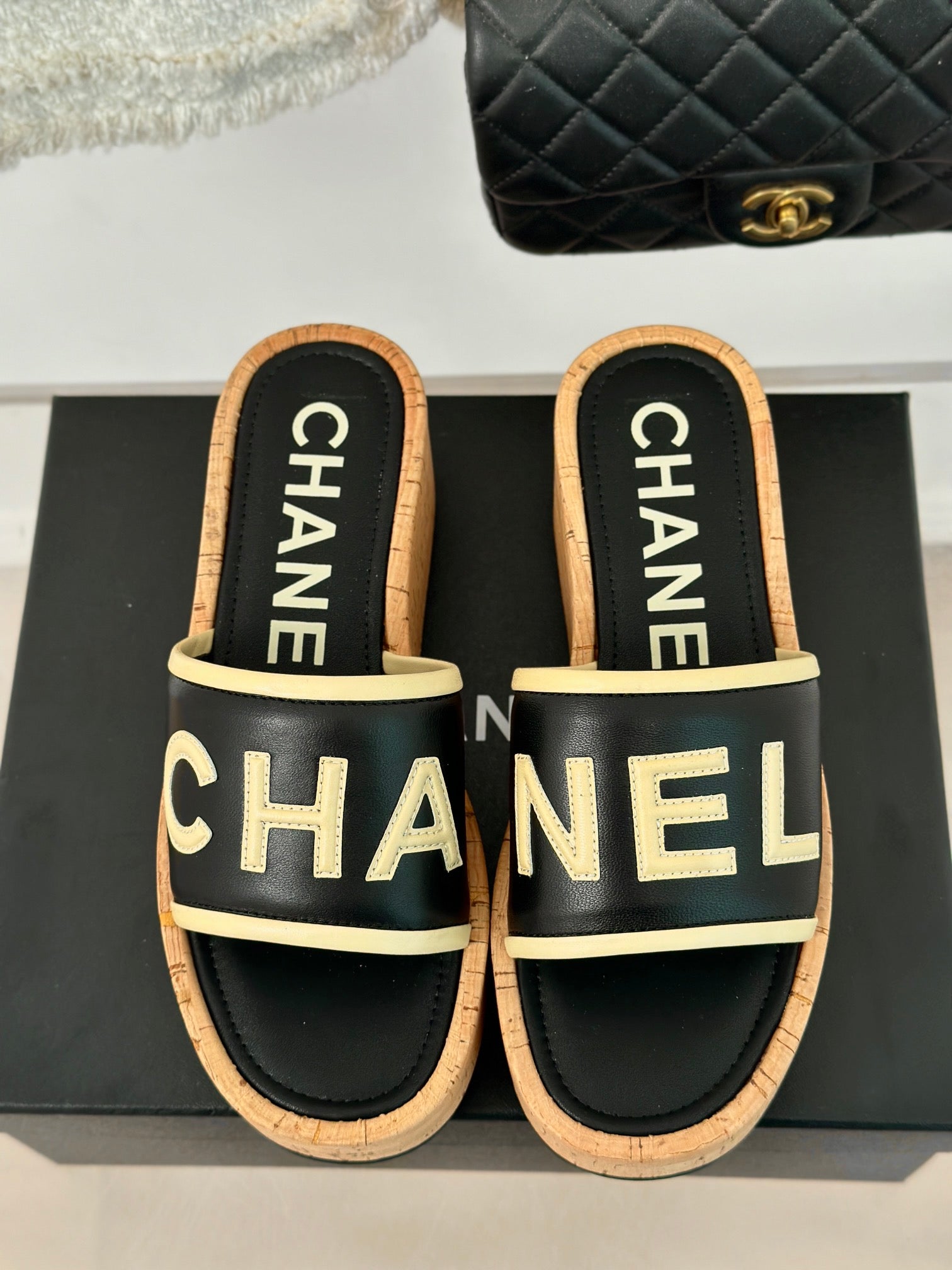 CHANEL THICK SOLE LETTER SLIPPERS IN BLACK SHEEPSKIN