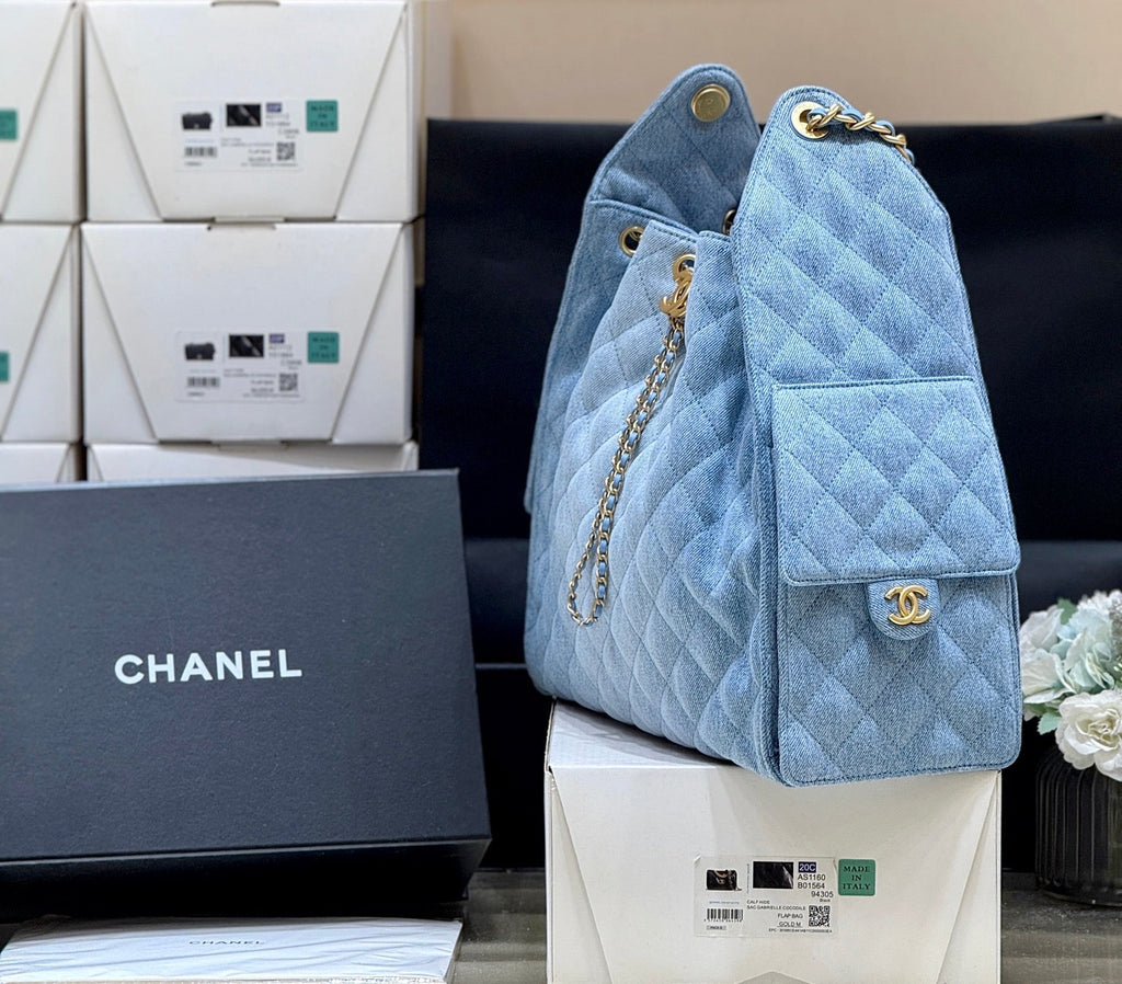 CHANEL 25 HANDBAG 40 IN BLUE DENIM GOLD HARDWARE