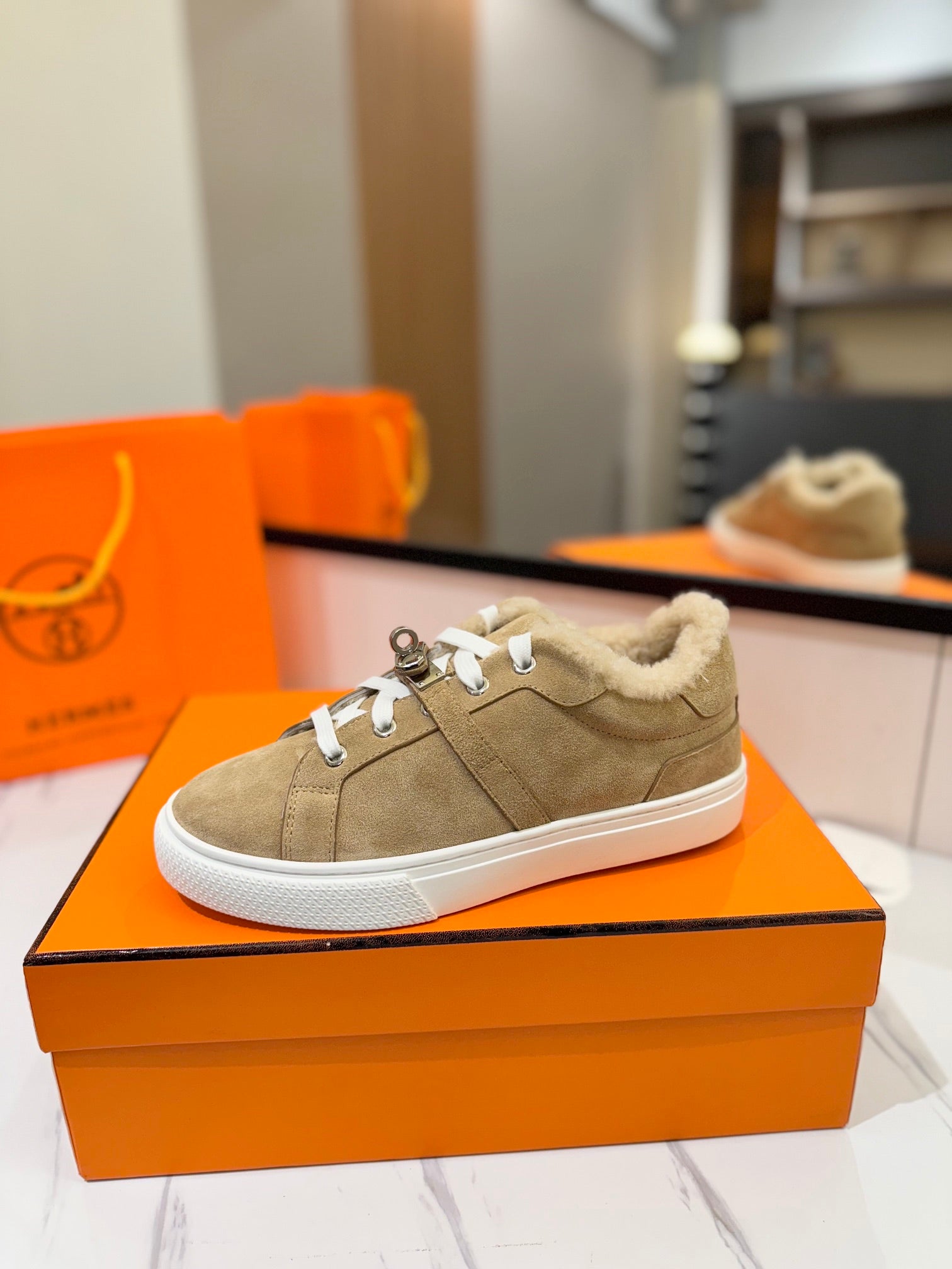 HERMES DAY SNEAKER IN TORTILLA BROWN SUEDE AND FLEECE LINING