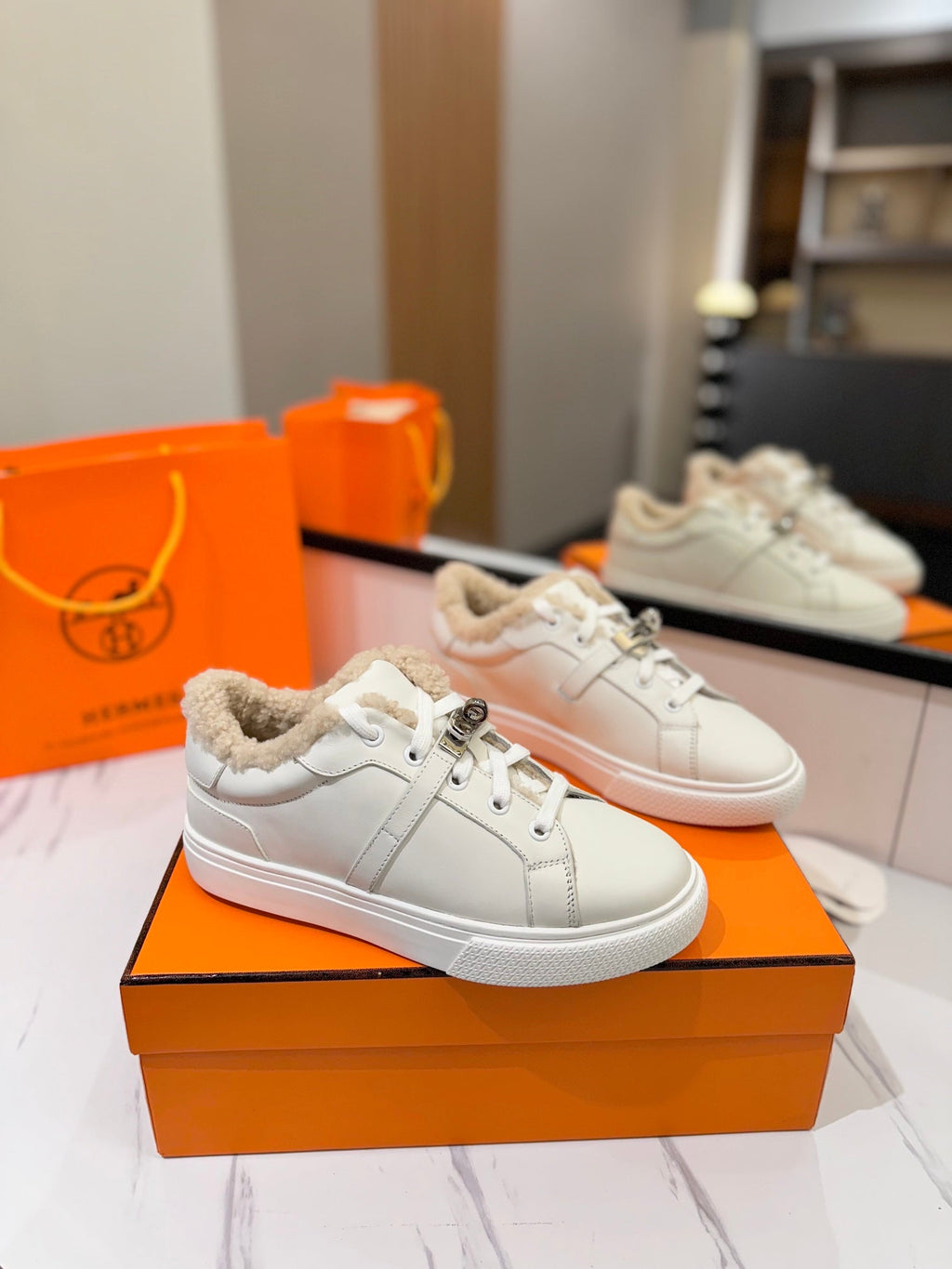 HERMES DAY SNEAKER IN WHITE CALFSKIN AND FLEECE LINING
