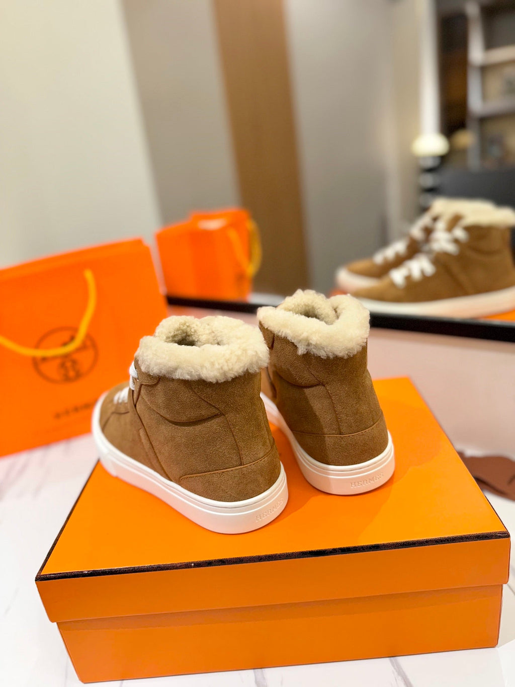 HERMES CHEALSEA BOOTS IN BRONZE BROWN SUEDE AND FLEECE LINING